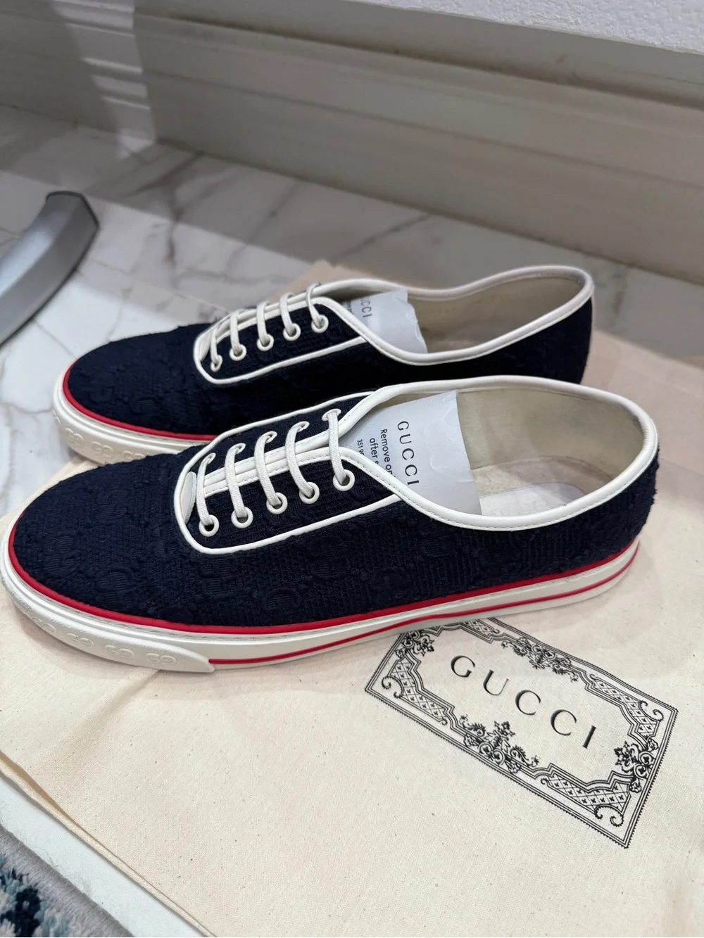 Gucci Black GG Canvas Low-Top Sneakers with White Trim and Red Stripe